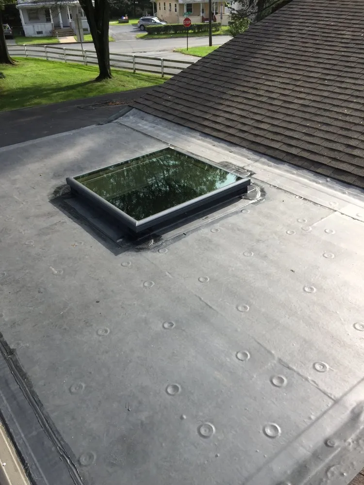 Slide of Muthard Roofing