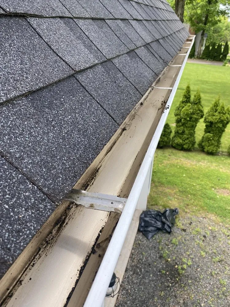 Slide of MVP Gutters and Roofing
