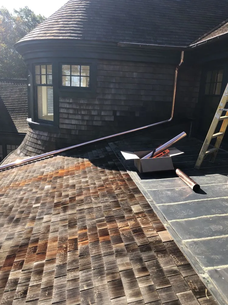 Slide of MVP Gutters and Roofing