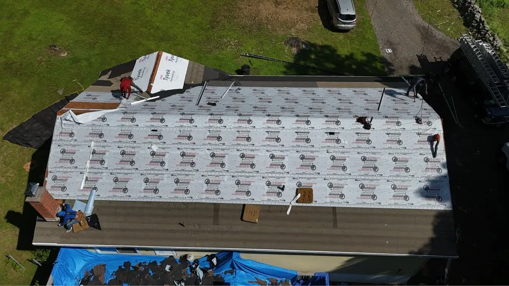 Slide of MVP Gutters and Roofing