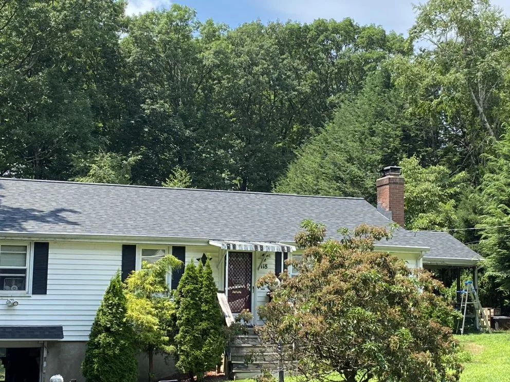 Slide of MVP Gutters and Roofing