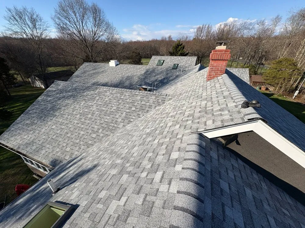 Slide of MVP Gutters and Roofing