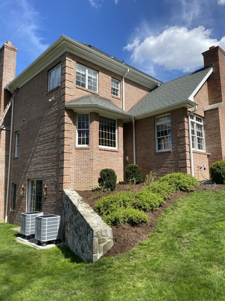 Slide of MVP Gutters and Roofing