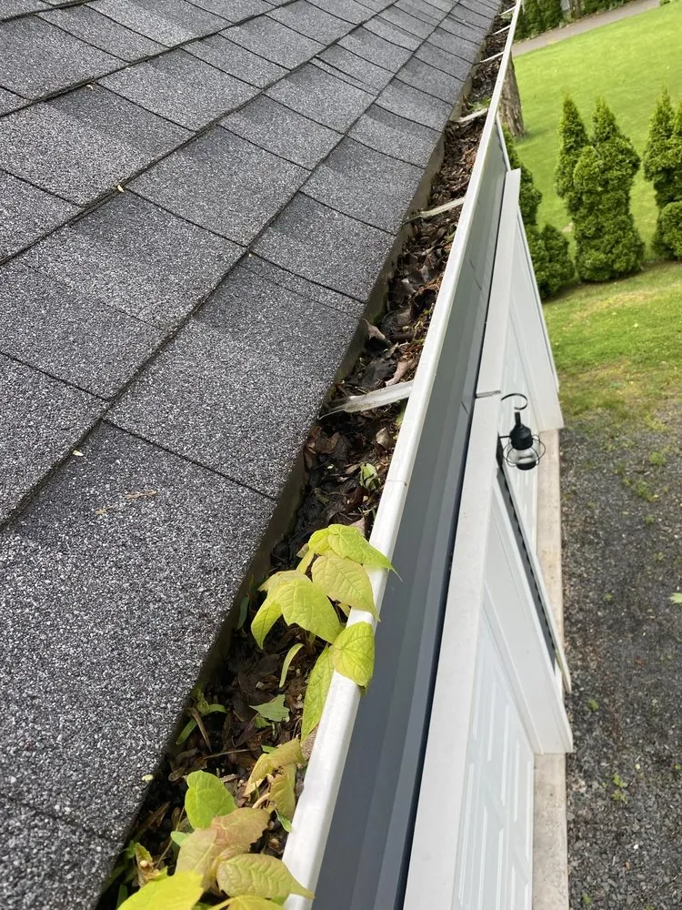Slide of MVP Gutters and Roofing