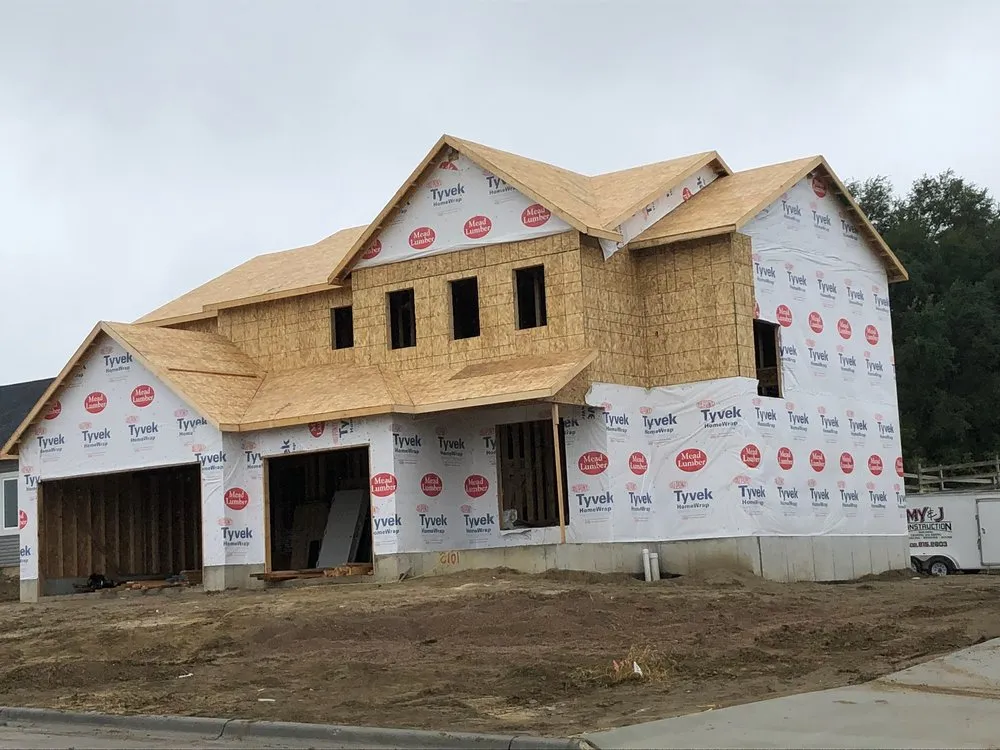 Slide of My & J Construction