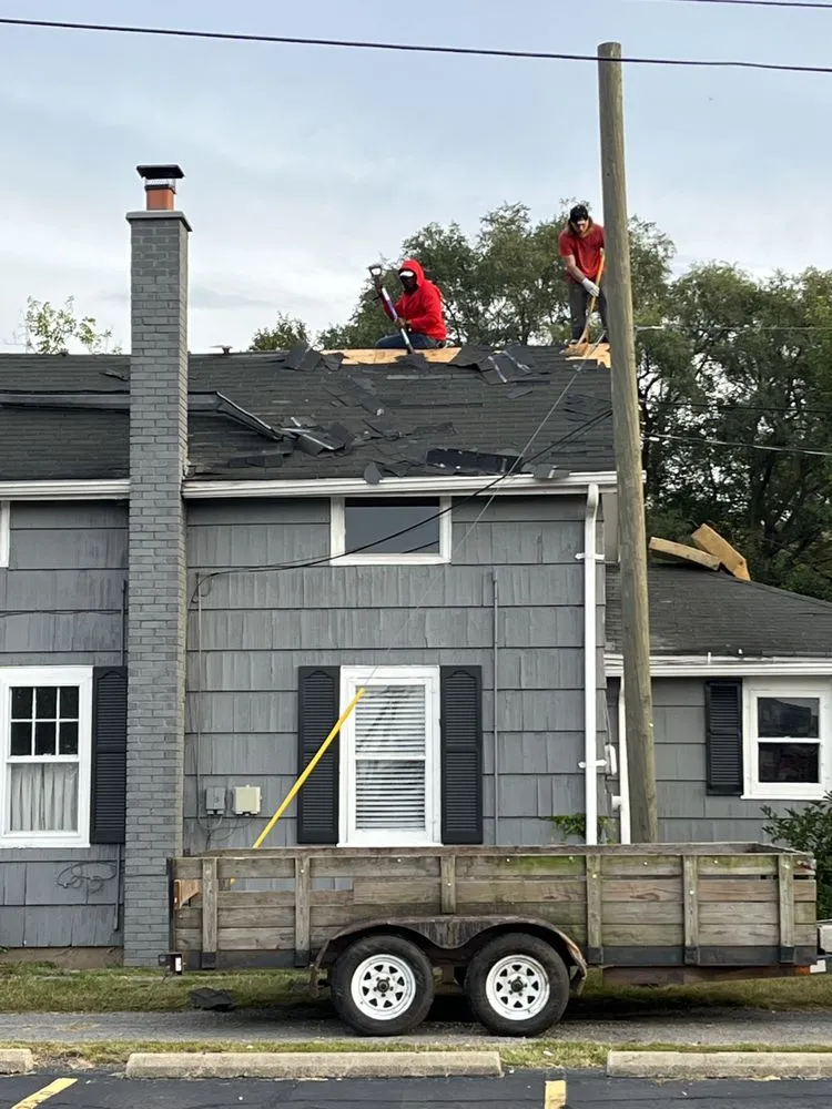 Slide of N the Dry Roofing