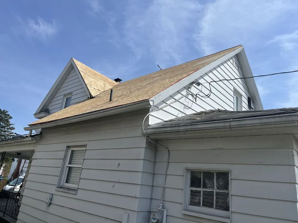 Slide of N the Dry Roofing