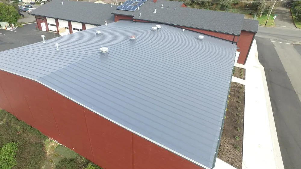 Slide of Nail It! Roofing Company