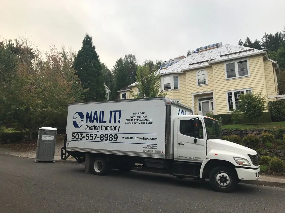 Slide of Nail It! Roofing Company