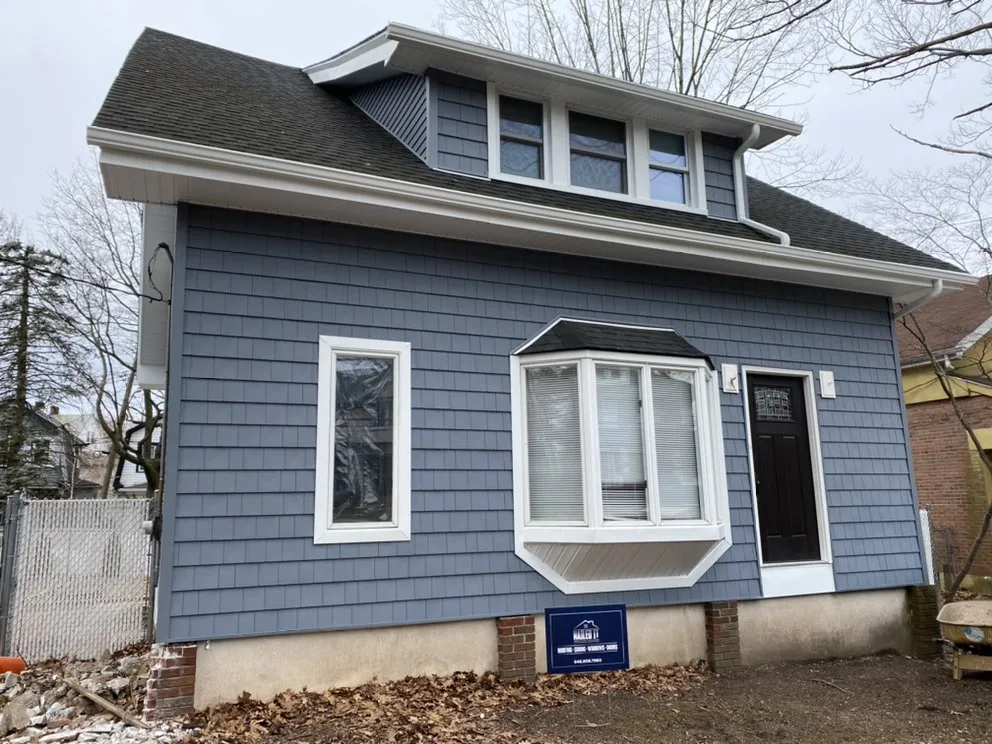 Slide of Nailed It Roofing & Siding