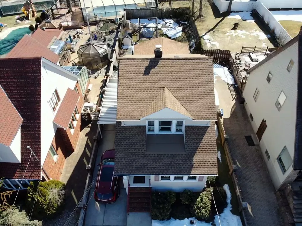 Slide of Nailed It Roofing & Siding