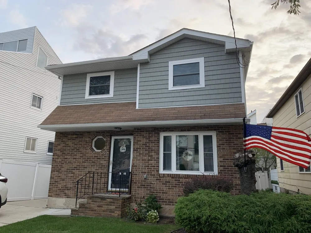 Slide of Nailed It Roofing & Siding