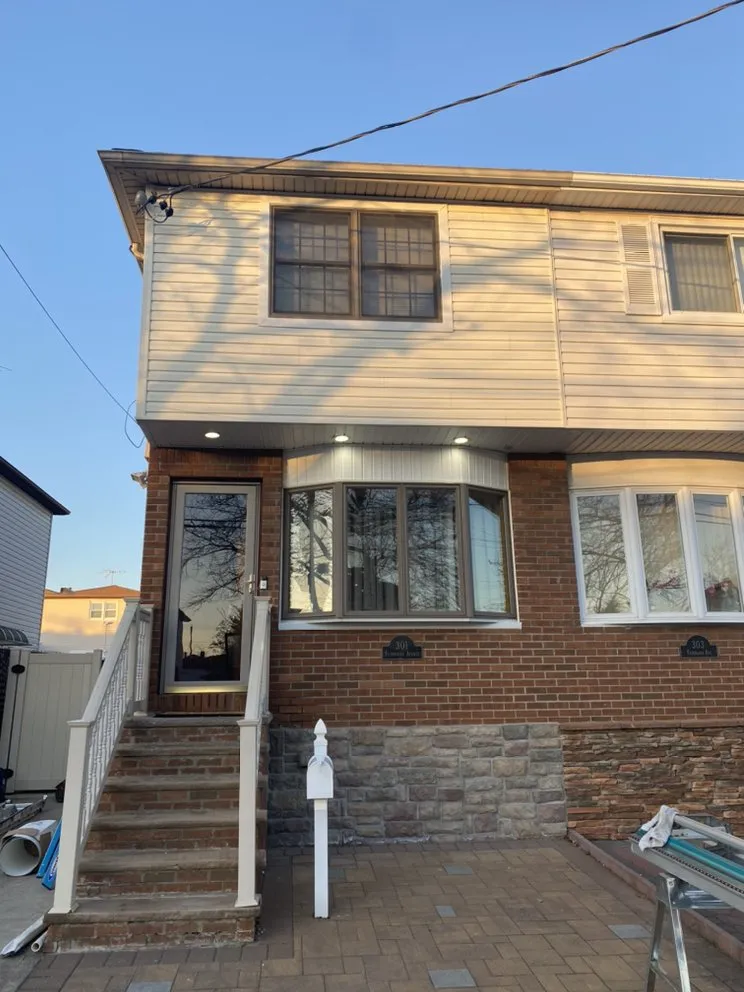 Slide of Nailed It Roofing & Siding