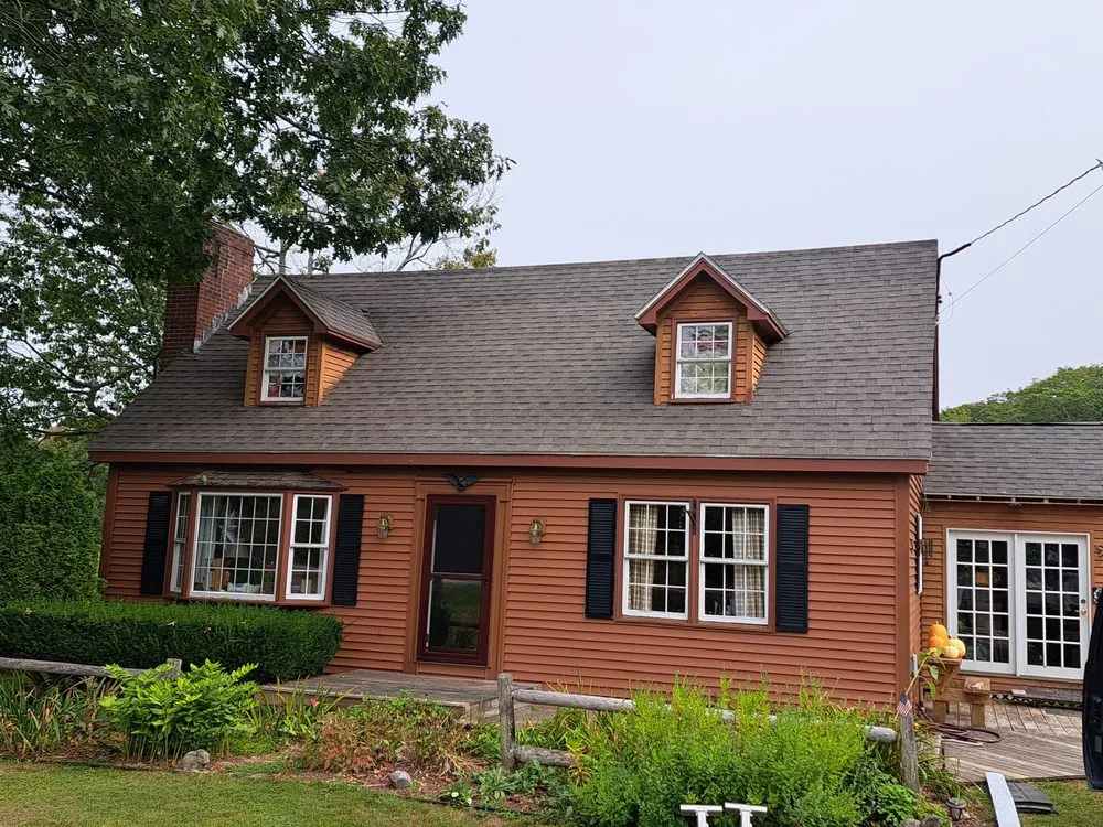 Slide of Nailed It Roofing