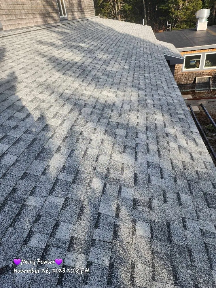 Slide of Nailed It Roofing