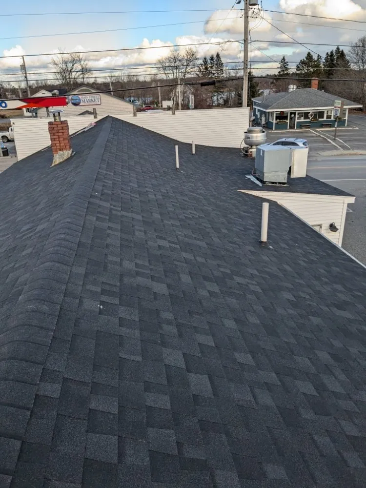 Slide of Nailed It Roofing