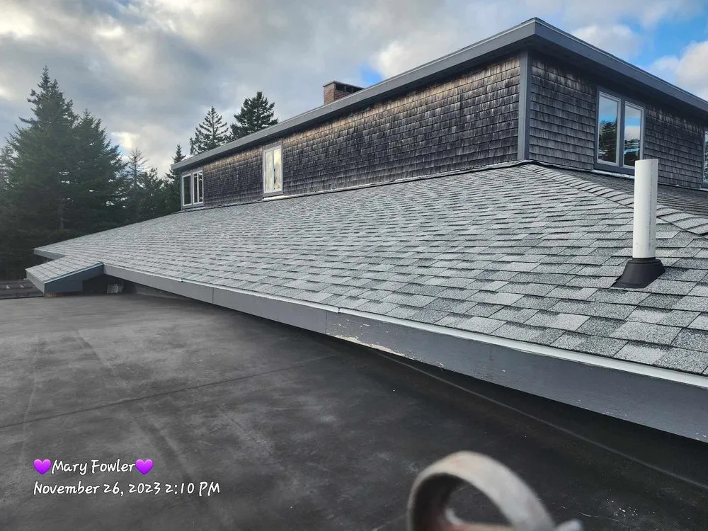 Slide of Nailed It Roofing