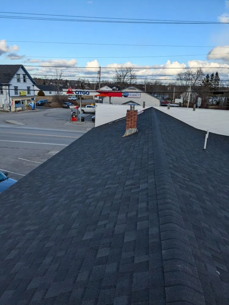 Slide of Nailed It Roofing
