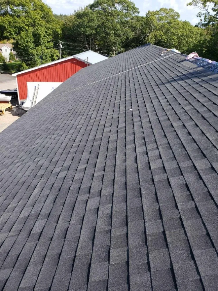 Slide of Nailed It Roofing