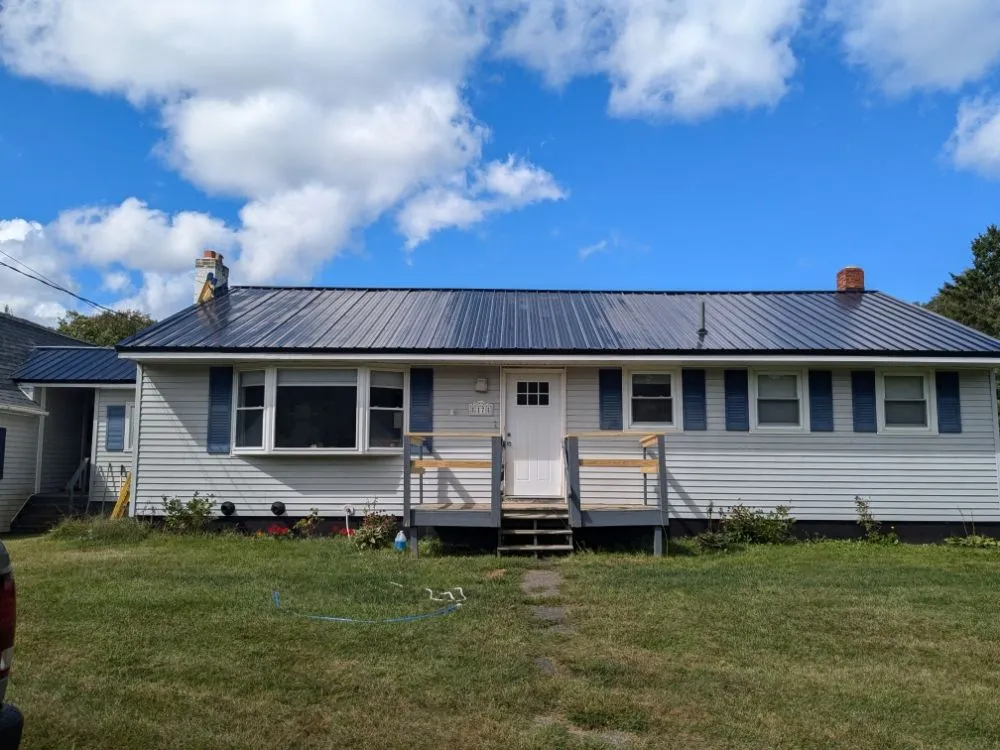 Slide of Nailed It Roofing