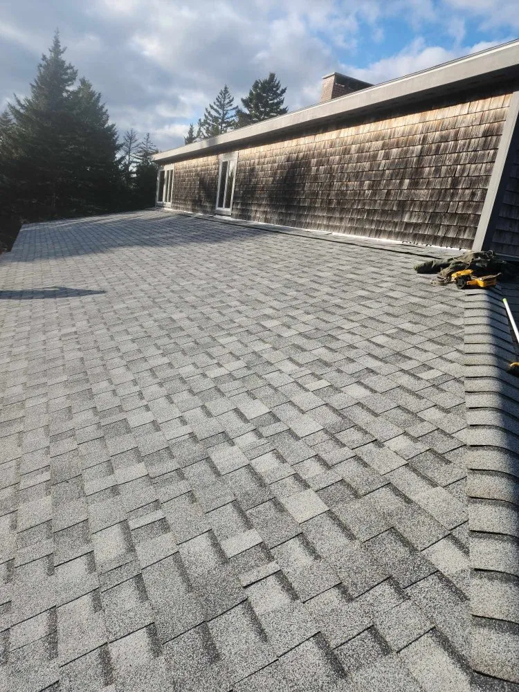 Slide of Nailed It Roofing