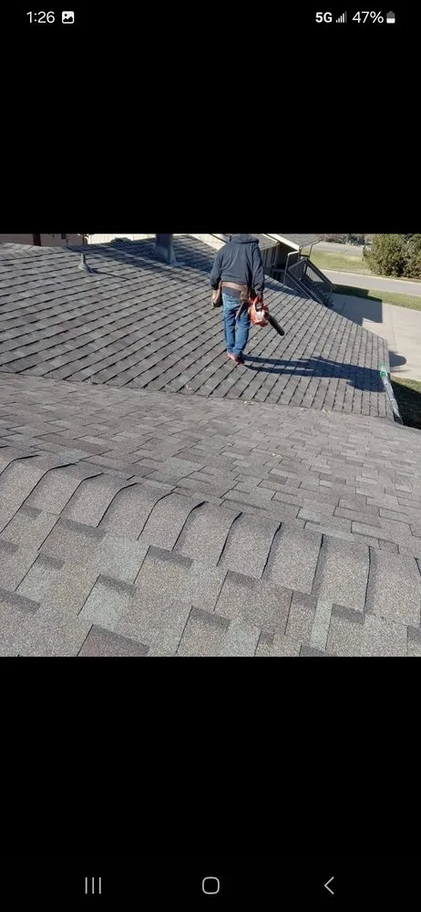 Slide of Najera Roofing