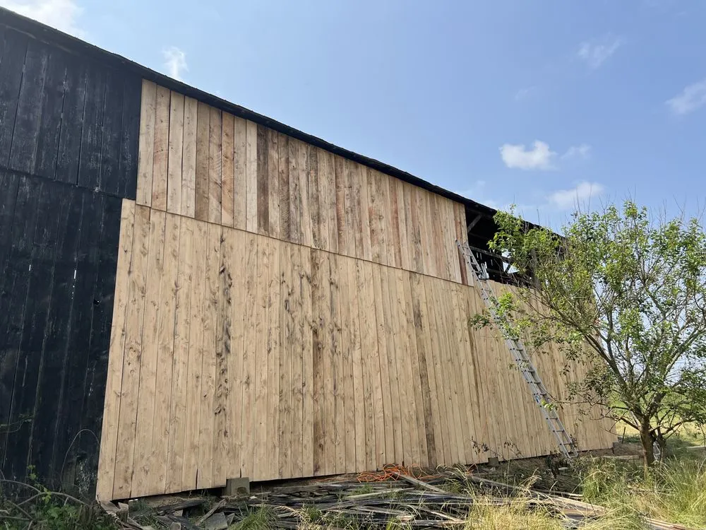 Slide of N’Amish Roofing