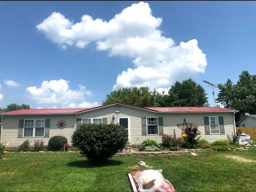 Slide of N’Amish Roofing