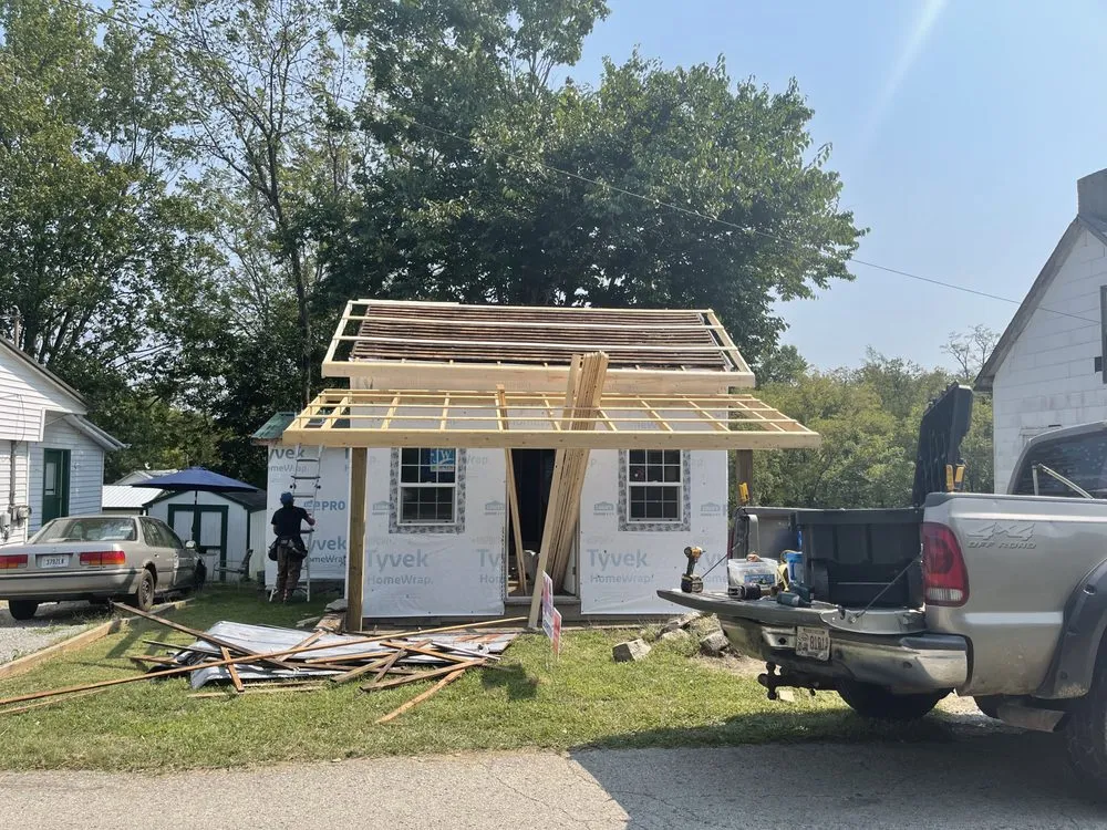 Slide of N’Amish Roofing