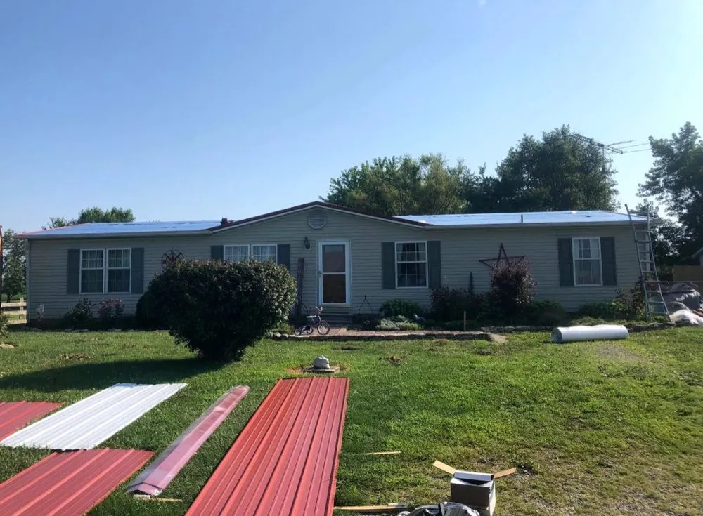 Slide of N’Amish Roofing