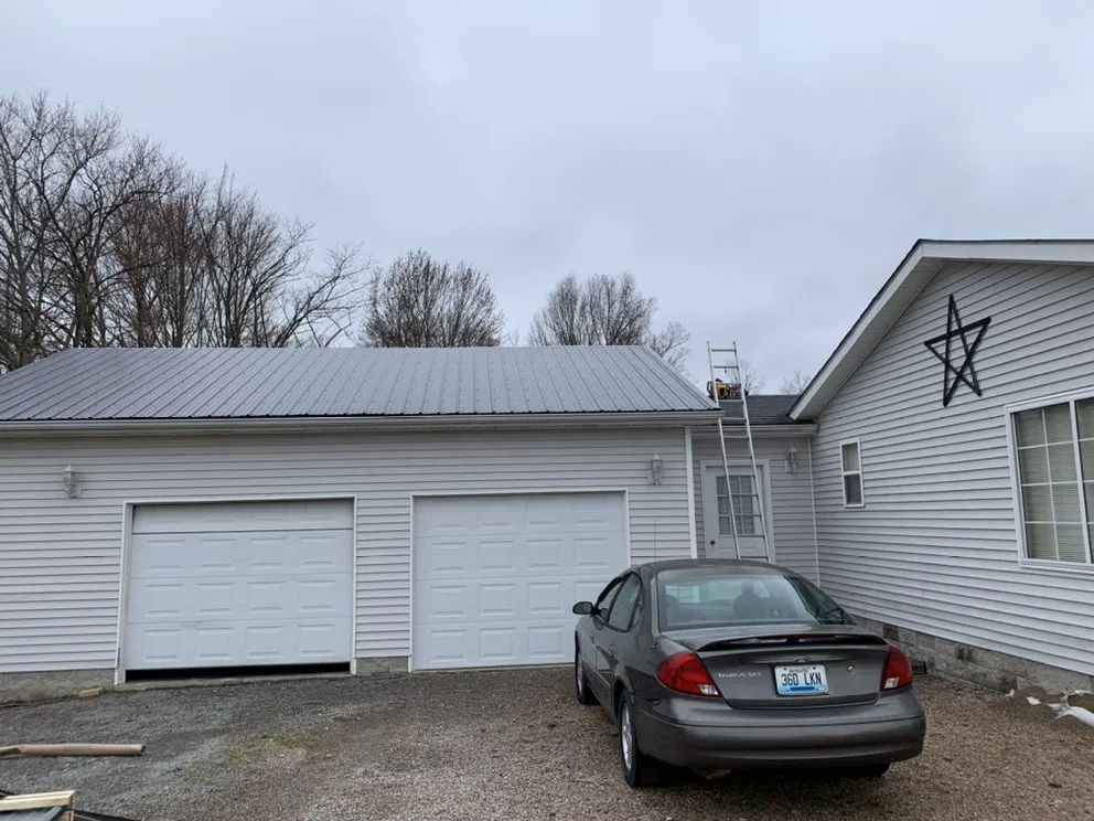 Slide of N’Amish Roofing