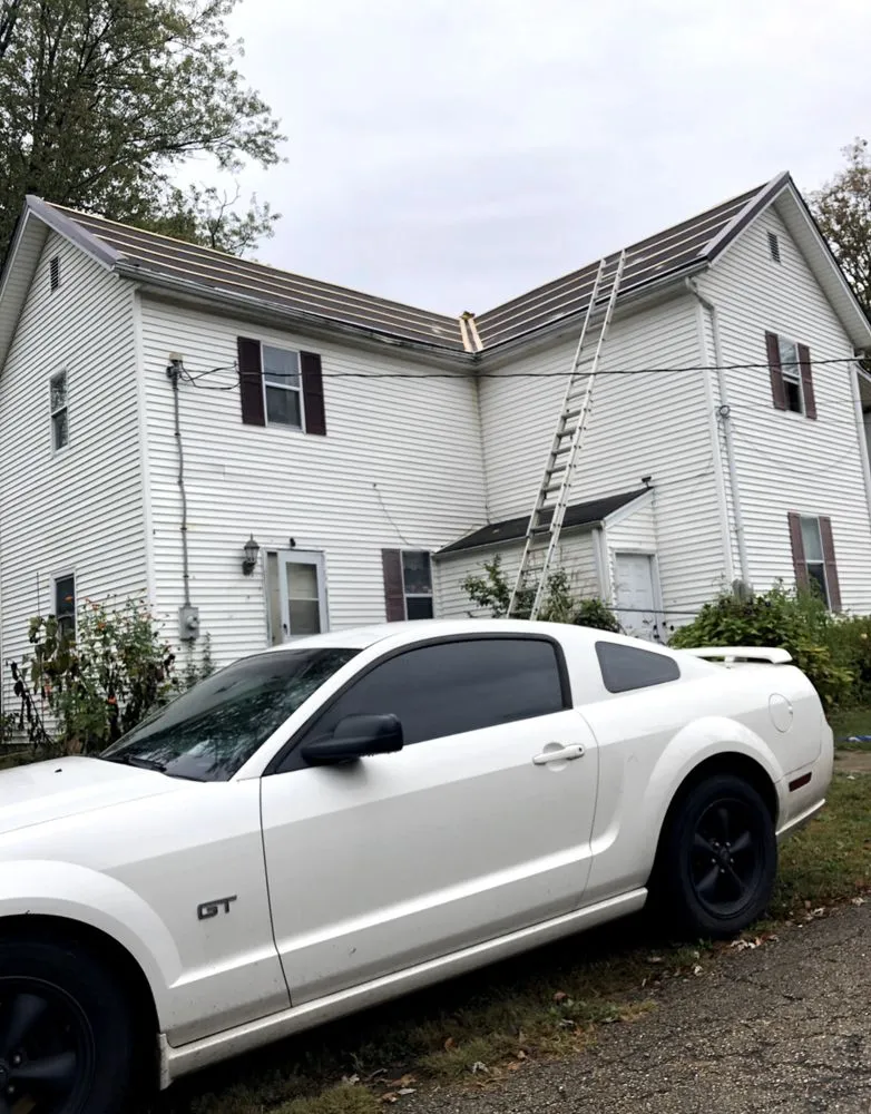 Slide of N’Amish Roofing