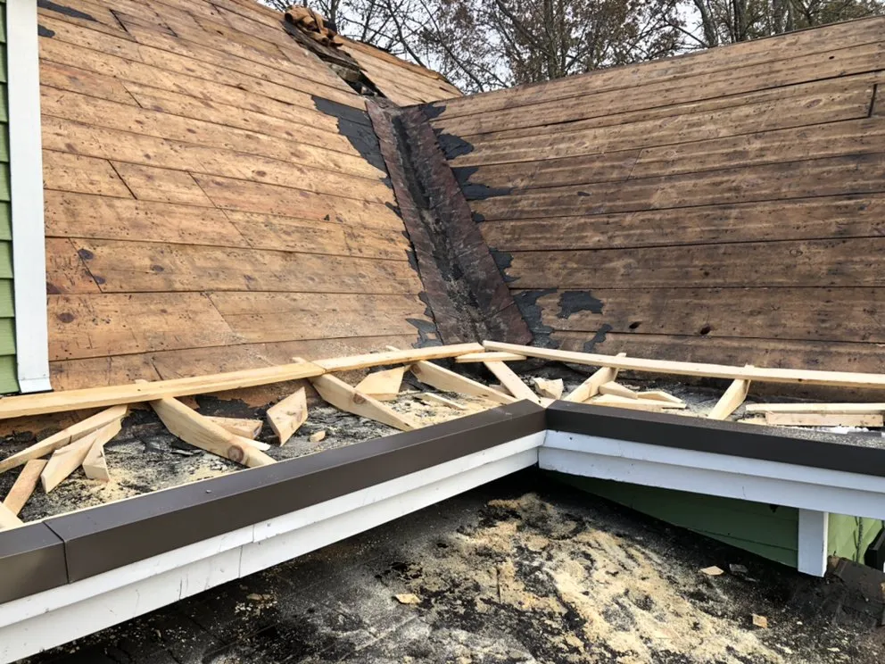 Slide of N’Amish Roofing