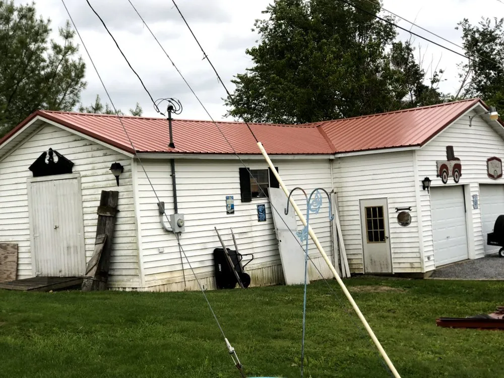 Slide of N’Amish Roofing