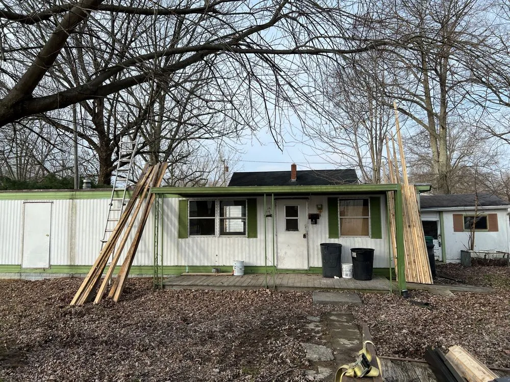 Slide of N’Amish Roofing