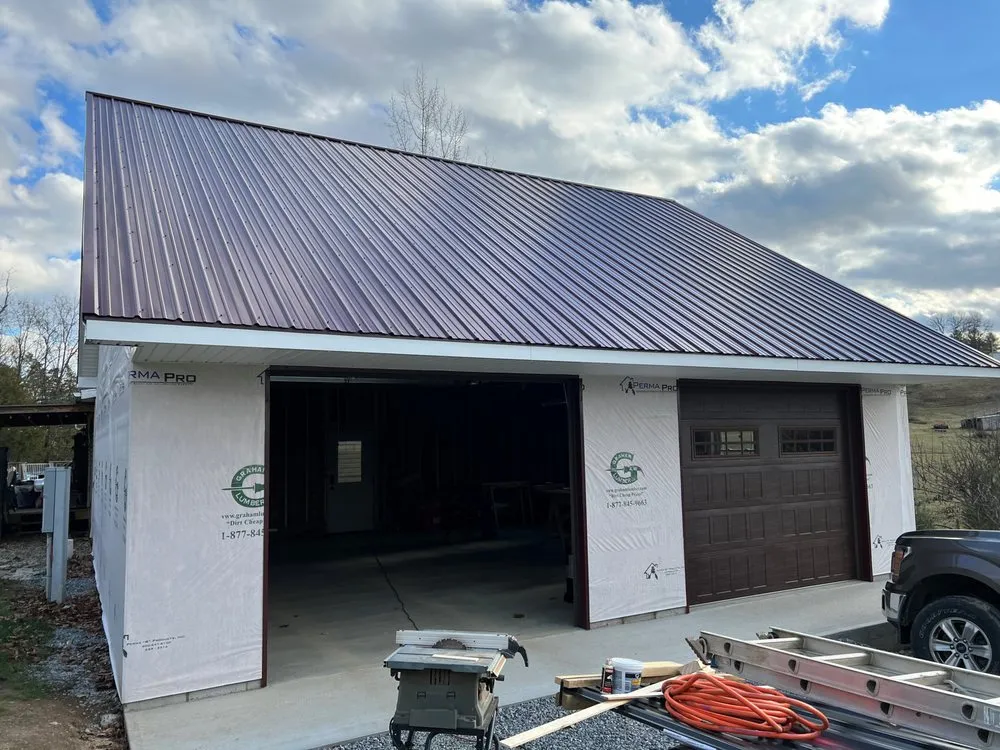Slide of N’Amish Roofing