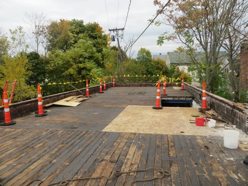 Slide of Naples Roofing
