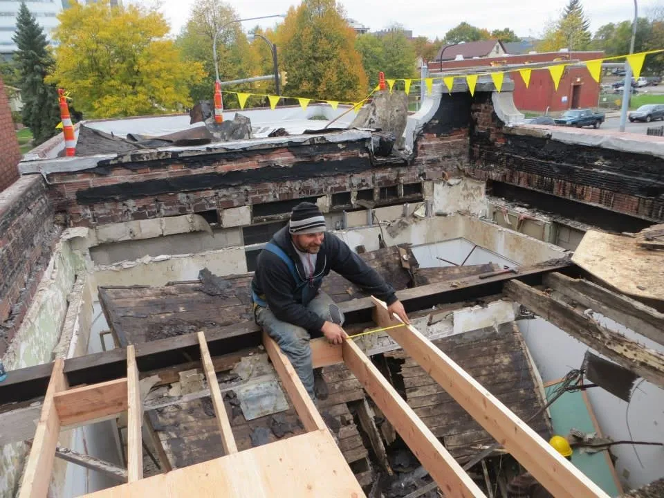 Slide of Naples Roofing