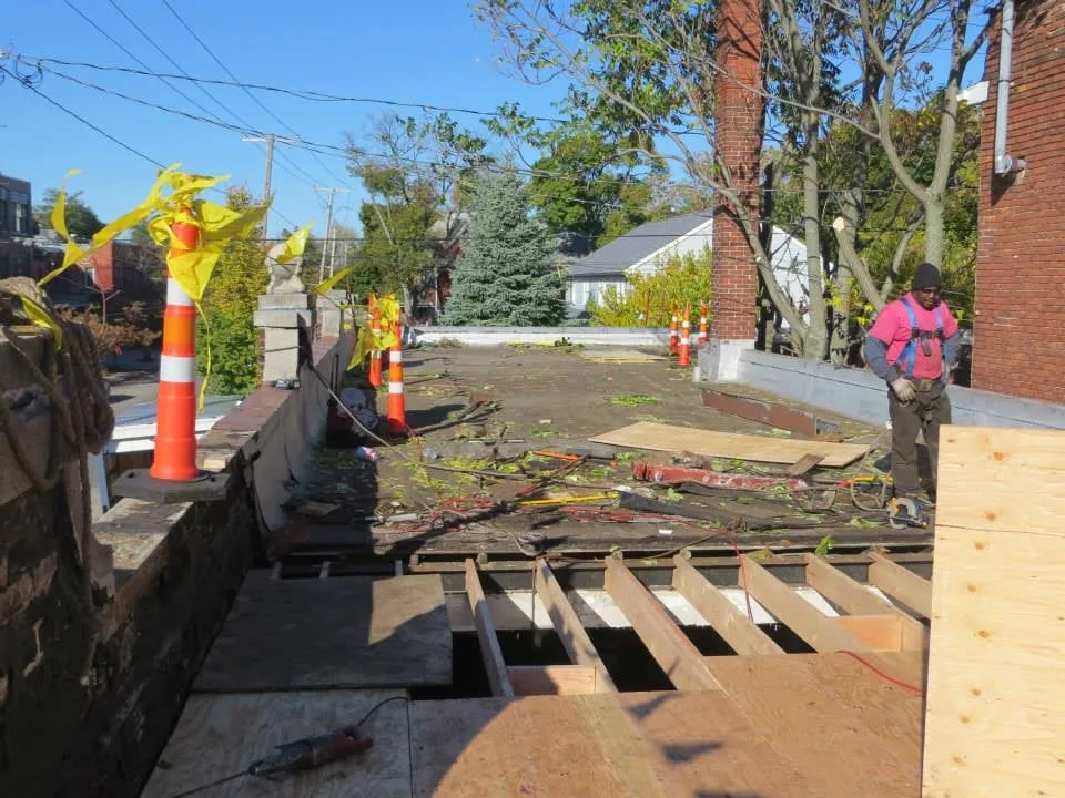 Slide of Naples Roofing
