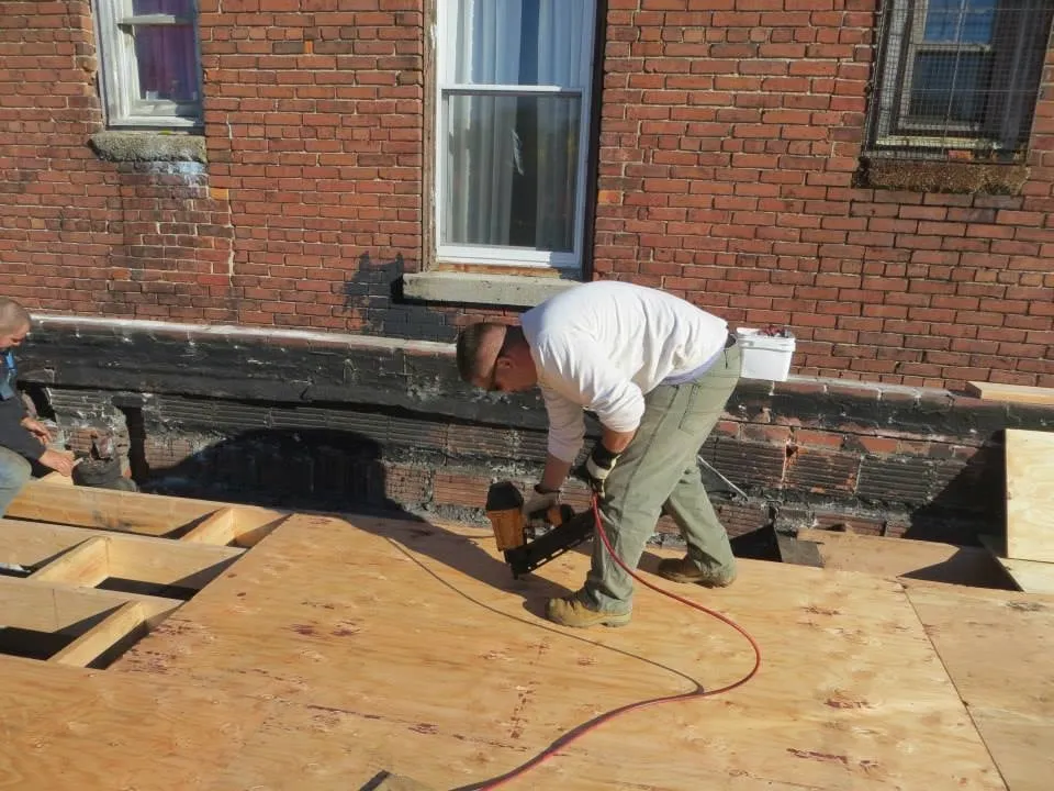 Slide of Naples Roofing