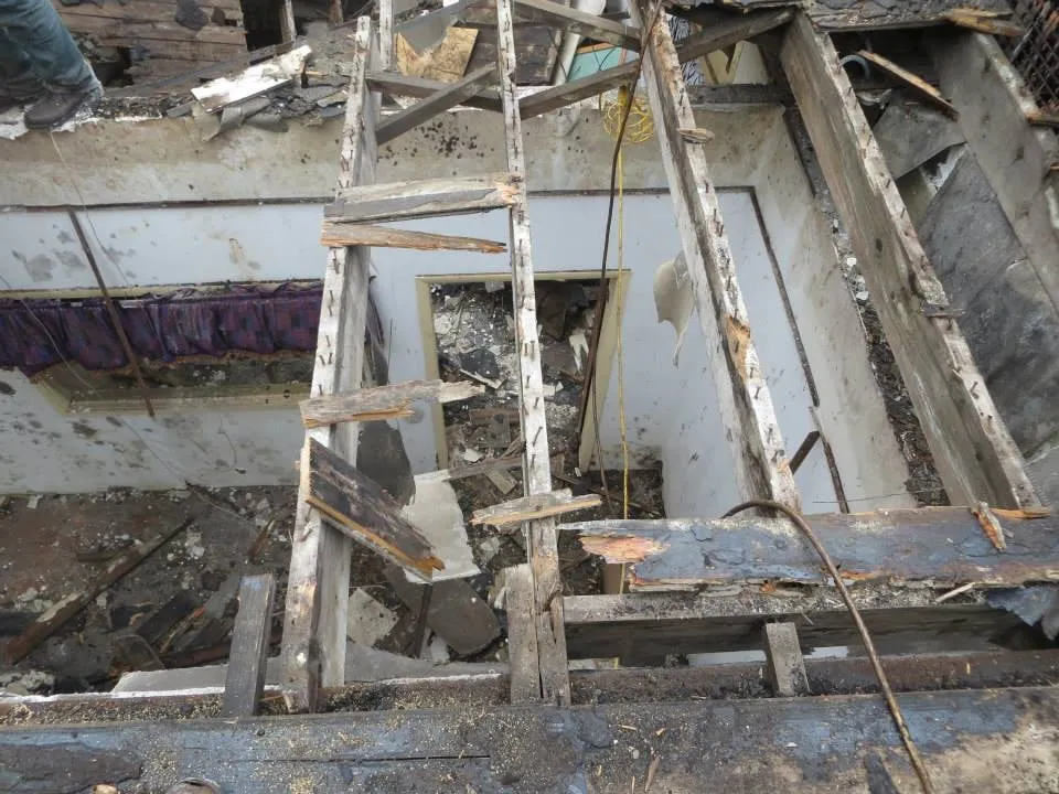 Slide of Naples Roofing