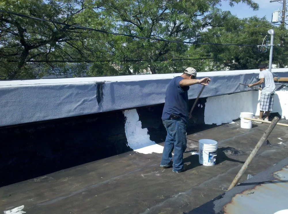 Slide of Nassau Roofers