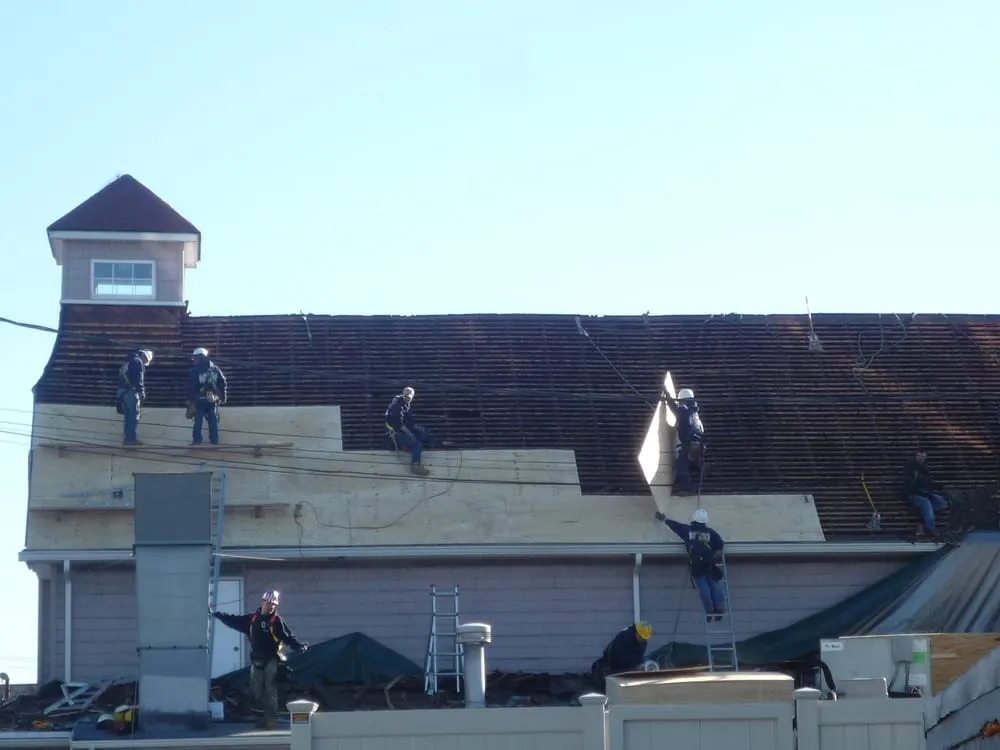 Slide of Nassau Roofers