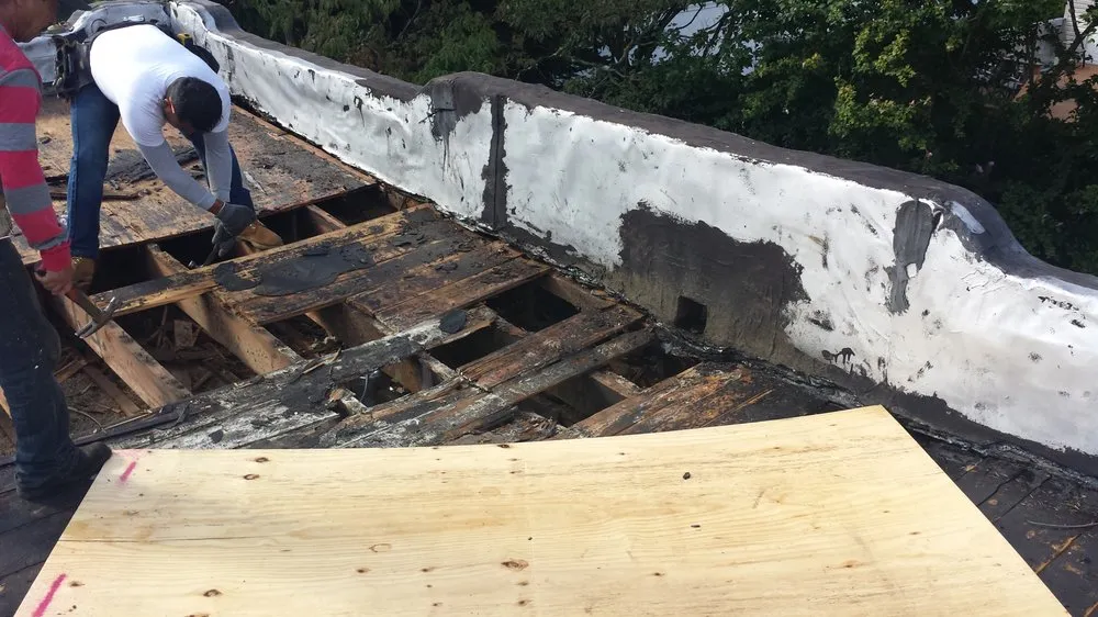 Slide of Nassau Roofers