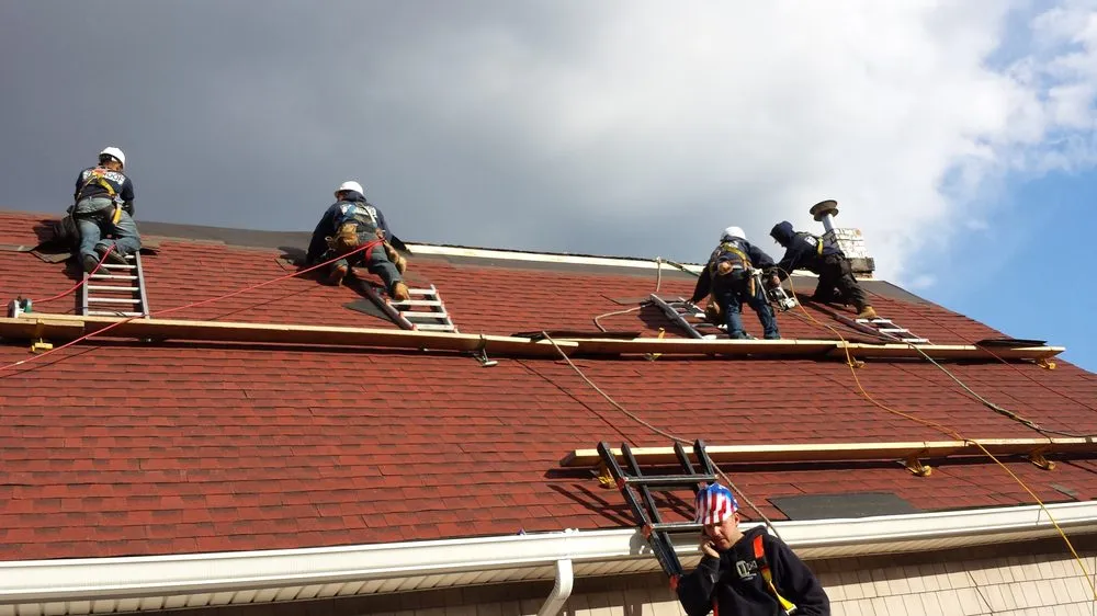 Slide of Nassau Roofers