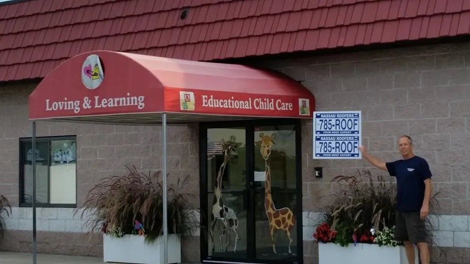 Slide of Nassau Roofers