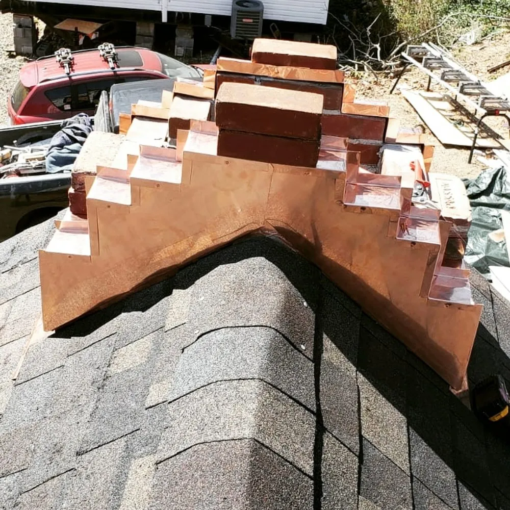 Slide of Nassau Roofers