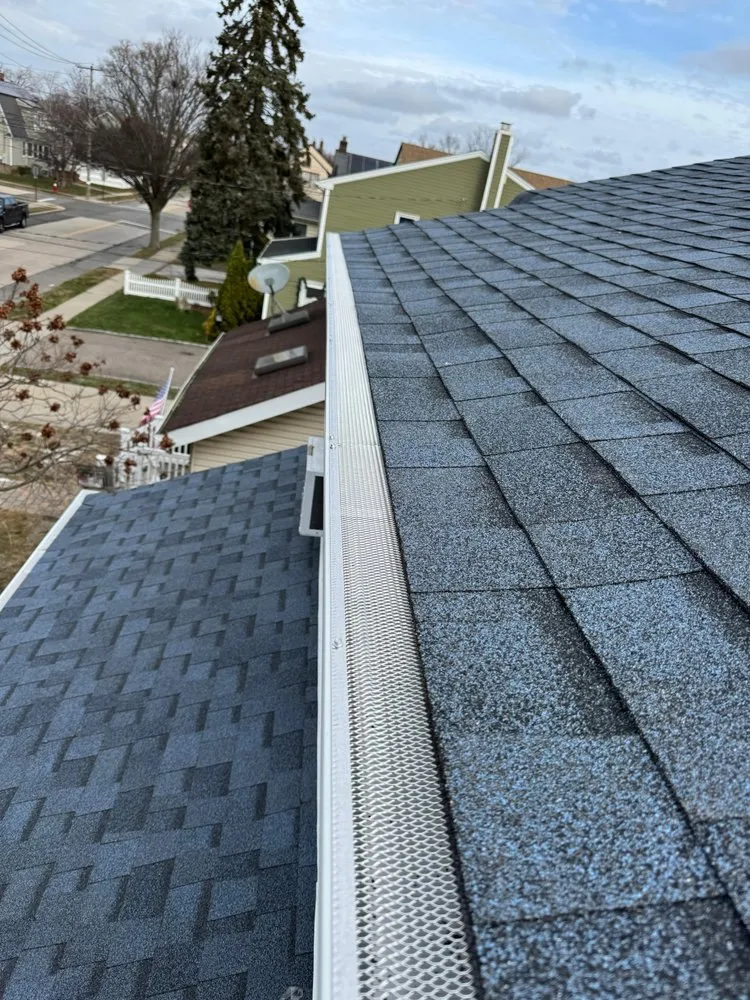 Slide of Nassau Roofers