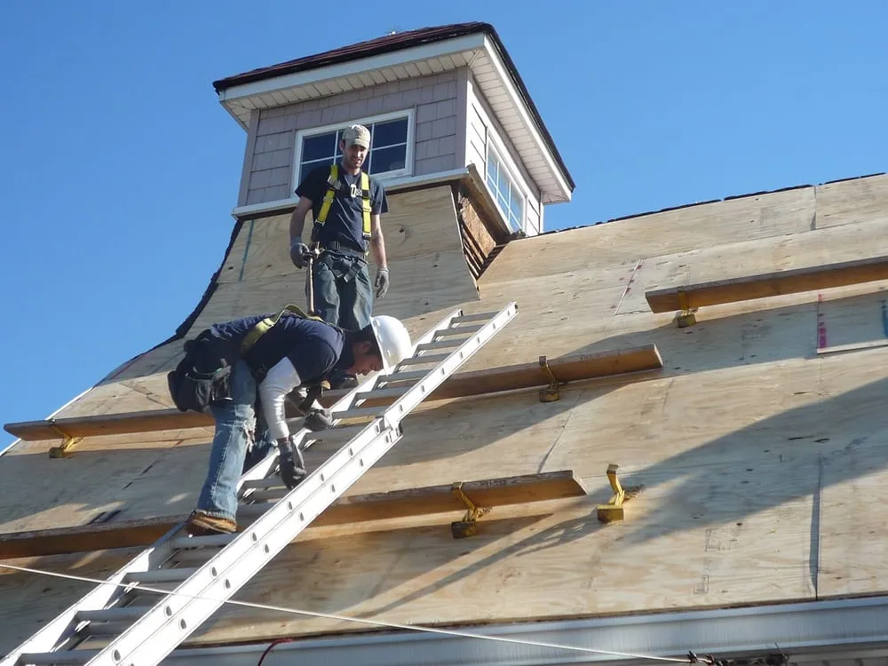 Slide of Nassau Roofers