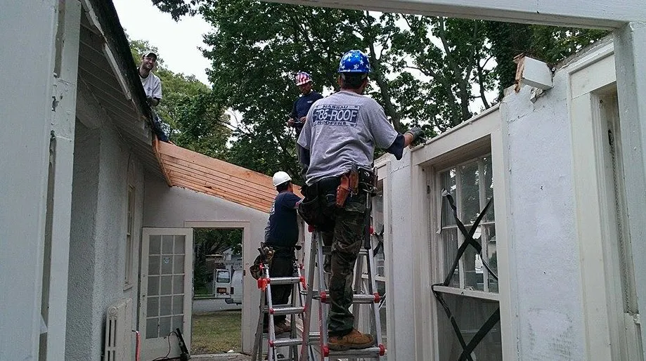 Slide of Nassau Roofers